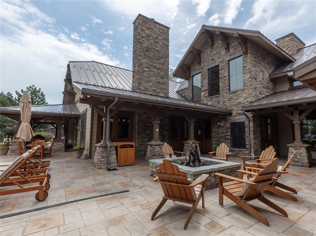 6104 Monterra Ave Unit L, Whitefish, MT 59937 - view of patio / terrace featuring a fire pit