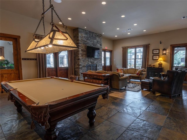 6104 Monterra Ave Unit L, Whitefish, MT 59937 - playroom featuring a fireplace, stone tile floors, plenty of natural light, recessed lighting, and billiards