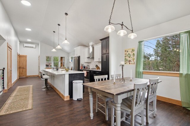 spare room with a healthy amount of sunlight, baseboards, dark wood finished floors, and visible vents