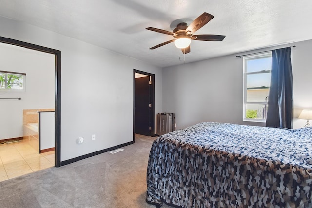 8745 US Highway 91 N, Conrad, MT 59425 - bedroom featuring multiple windows, baseboards, light carpet, and a ceiling fan