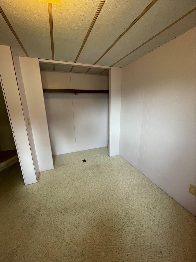 381 Lyng Ave W, Highwood, MT 59450 - unfurnished room featuring a textured ceiling and carpet flooring