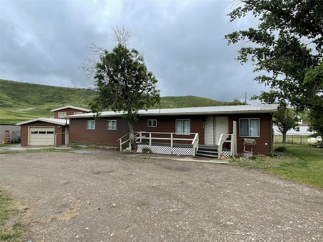381 Lyng Ave W, Highwood, MT 59450 - view of front of property with an outbuilding, driveway, and a porch