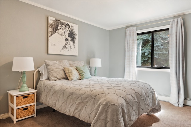 bedroom with carpet, ornamental molding, and baseboards