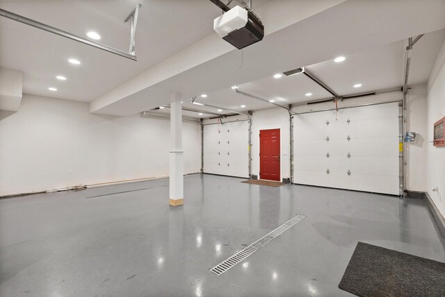 31572 Lake To Sky Dr, Bigfork, MT 59911 - garage with a garage door opener and recessed lighting