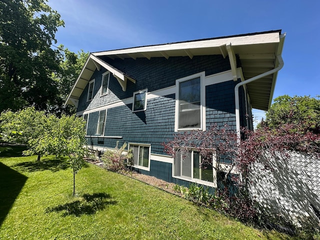 815 3rd Ave E, Kalispell, MT 59901 - view of property exterior featuring a lawn