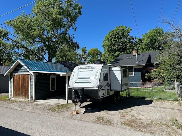 815 3rd Ave E, Kalispell, MT 59901 - view of front of home with metal roof and asphalt driveway