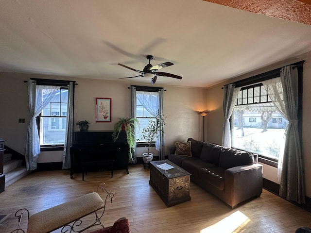 815 3rd Ave E, Kalispell, MT 59901 - living room with light wood-style flooring and a ceiling fan