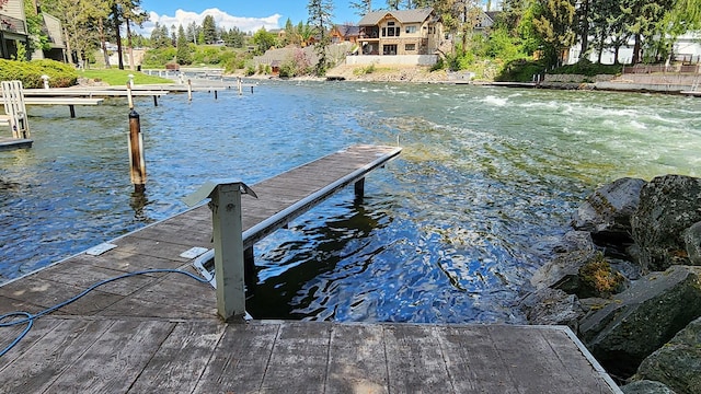 270 Bridge St Unit Qc1-203, Bigfork, MT 59911 - dock featuring a water view