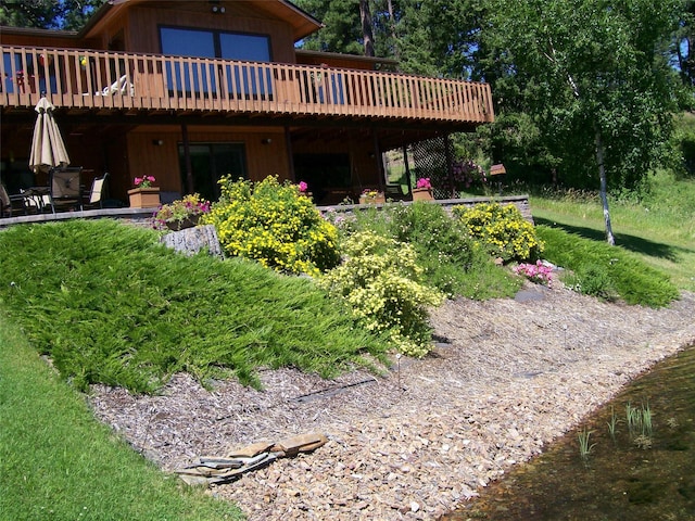 306 Parker Lakes Rd, Bigfork, MT 59911 - back of property with a deck