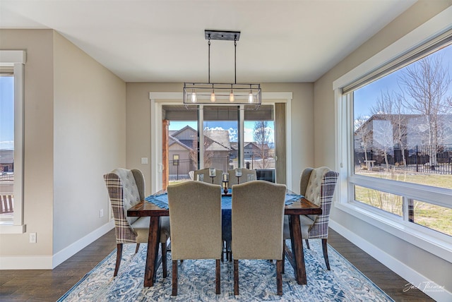 2883 Alpine View Loop, Helena, MT 59601 - dining space featuring baseboards and dark wood finished floors