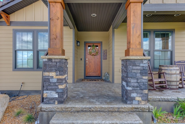 2883 Alpine View Loop, Helena, MT 59601 - doorway to property with a porch and board and batten siding
