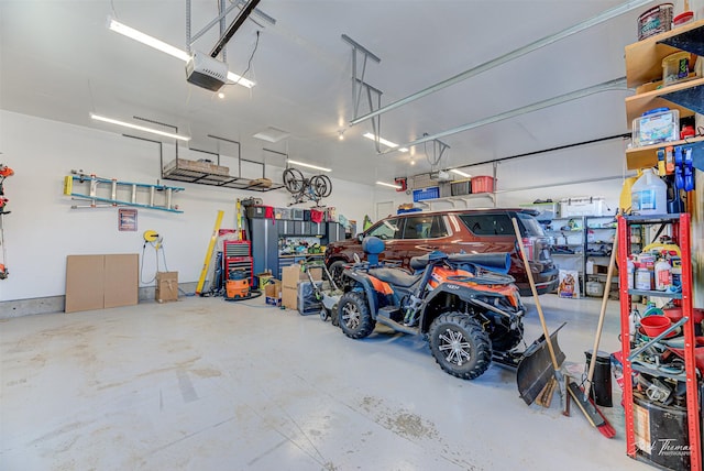 2883 Alpine View Loop, Helena, MT 59601 - garage featuring a garage door opener