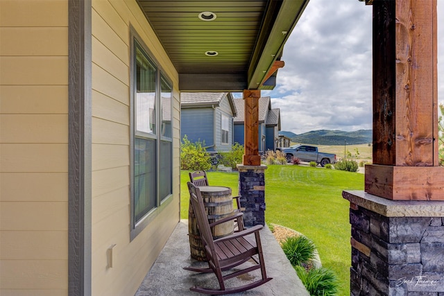 2883 Alpine View Loop, Helena, MT 59601 - porch featuring a yard and a mountain view