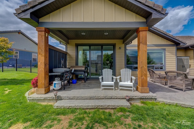 2883 Alpine View Loop, Helena, MT 59601 - rear view of house with a patio area and board and batten siding