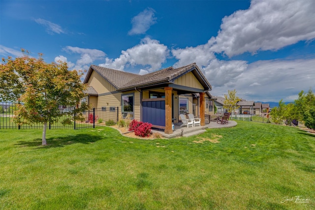 2883 Alpine View Loop, Helena, MT 59601 - back of property with a patio area and board and batten siding