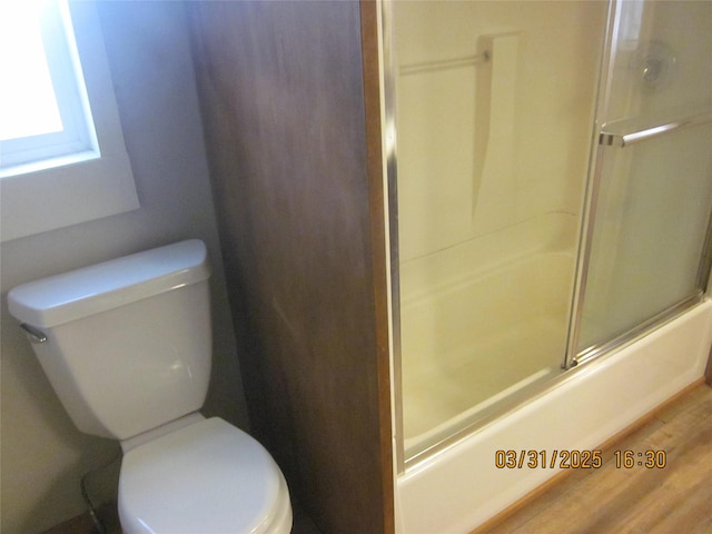4612 Richlie St, Missoula, MT 59808 - full bathroom featuring a shower with door and wood finished floors