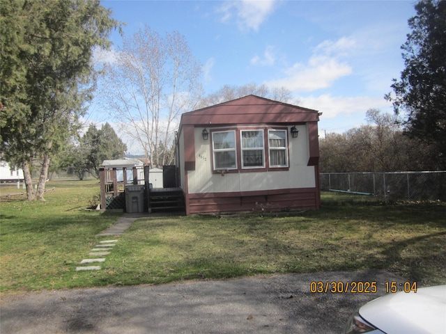 4612 Richlie St, Missoula, MT 59808 - view of front facade with a wooden deck and stairs
