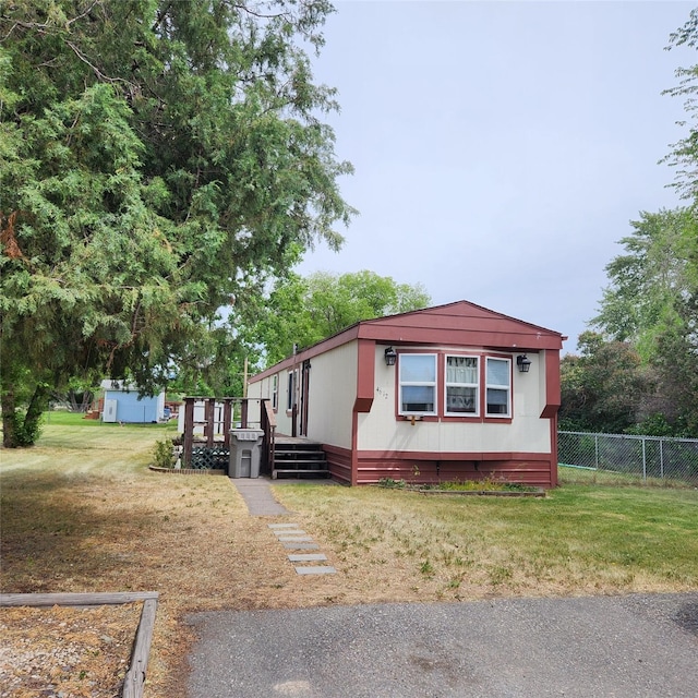 4612 Richlie St, Missoula, MT 59808 - view of front of house with a wooden deck