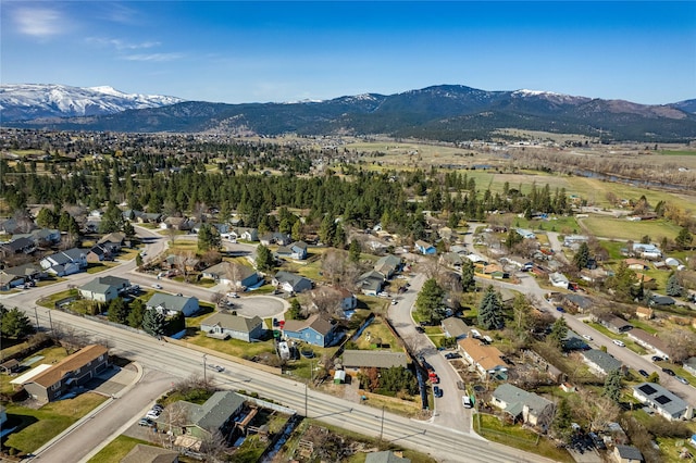 drone / aerial view with a mountain view and a residential view