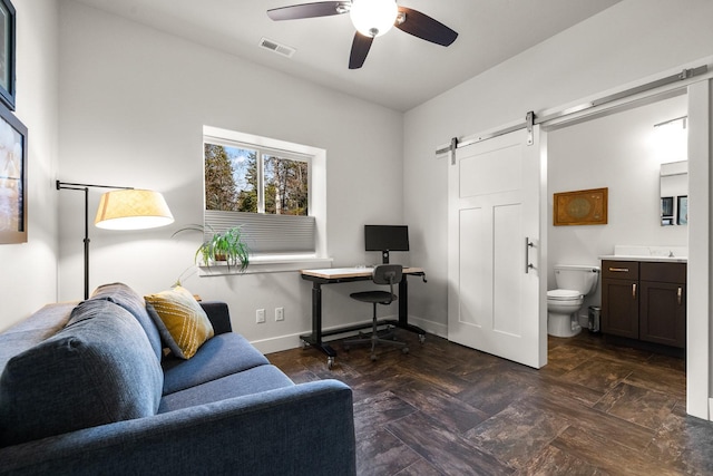 304 Stumptown Loop, Whitefish, MT 59937 - office space with a barn door and a ceiling fan