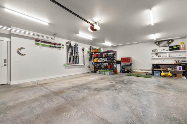 304 Stumptown Loop, Whitefish, MT 59937 - garage featuring a workshop area and a garage door opener
