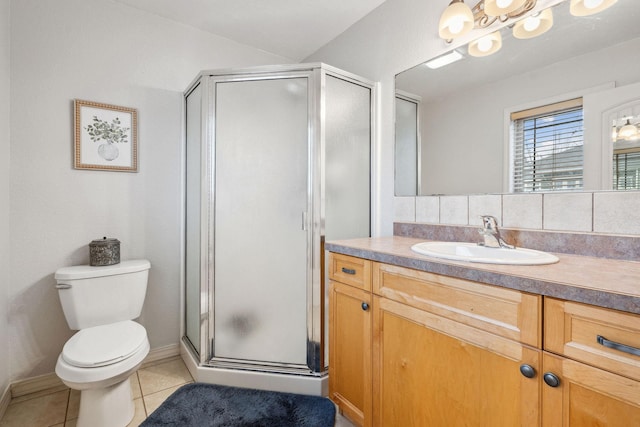 425 Northridge Dr, Kalispell, MT 59901 - full bath with a shower stall, tile patterned flooring, vanity, and toilet