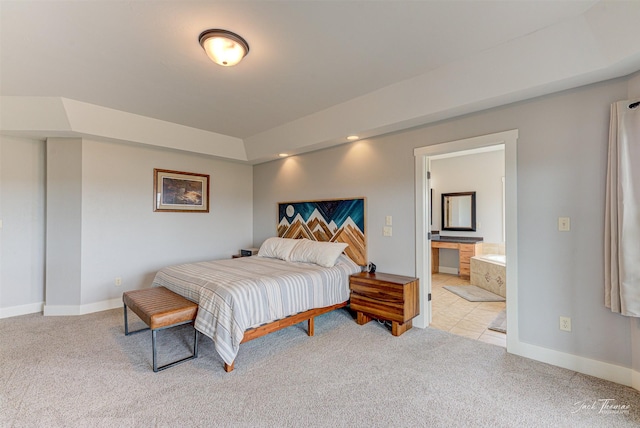 2160 Crested Wheat Loop, East Helena, MT 59635 - bedroom featuring light carpet, baseboards, and ensuite bath