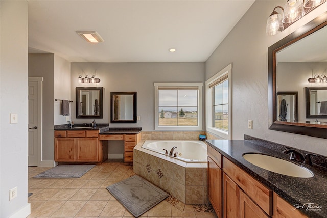 2160 Crested Wheat Loop, East Helena, MT 59635 - full bath featuring a sink, two vanities, tile patterned flooring, and a garden tub