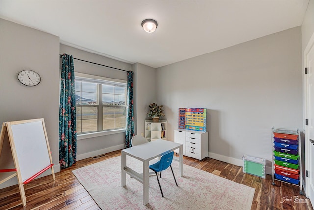 2160 Crested Wheat Loop, East Helena, MT 59635 - rec room featuring visible vents, baseboards, and wood finished floors