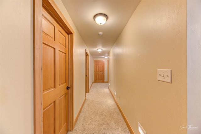 2160 Crested Wheat Loop, East Helena, MT 59635 - hall featuring light colored carpet and baseboards