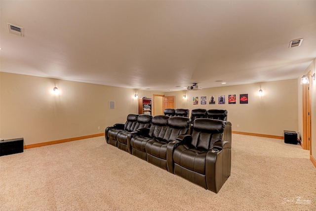 2160 Crested Wheat Loop, East Helena, MT 59635 - home theater featuring light carpet, baseboards, and visible vents