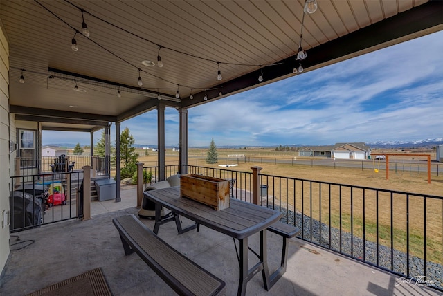 2160 Crested Wheat Loop, East Helena, MT 59635 - view of patio featuring a rural view and fence