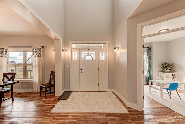 2160 Crested Wheat Loop, East Helena, MT 59635 - foyer with baseboards, a high ceiling, and wood finished floors