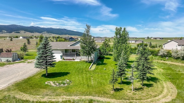 24 Spruce Grove Rd, East Helena, MT 59635 - aerial view of property and surrounding area featuring mountains