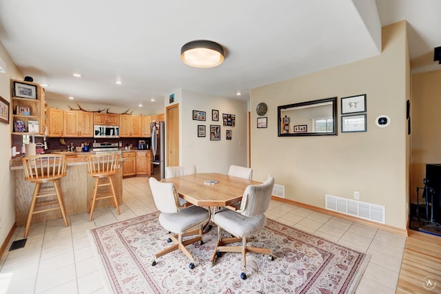 24 Spruce Grove Rd, East Helena, MT 59635 - dining area with light tile patterned floors and recessed lighting