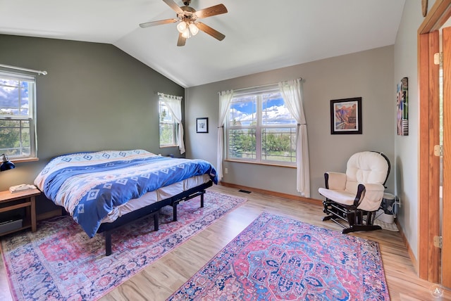 24 Spruce Grove Rd, East Helena, MT 59635 - bedroom featuring wood finished floors, lofted ceiling, and ceiling fan