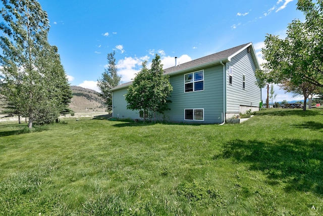 24 Spruce Grove Rd, East Helena, MT 59635 - back of property with a lawn