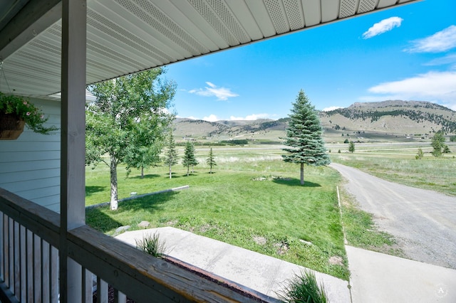 24 Spruce Grove Rd, East Helena, MT 59635 - view of green lawn featuring a rural view and a mountain view