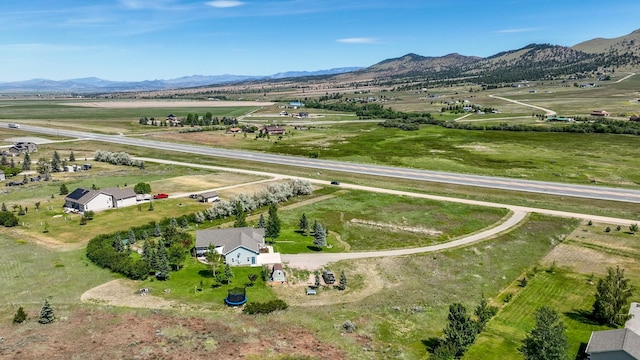 24 Spruce Grove Rd, East Helena, MT 59635 - view of rural area featuring a mountainous background