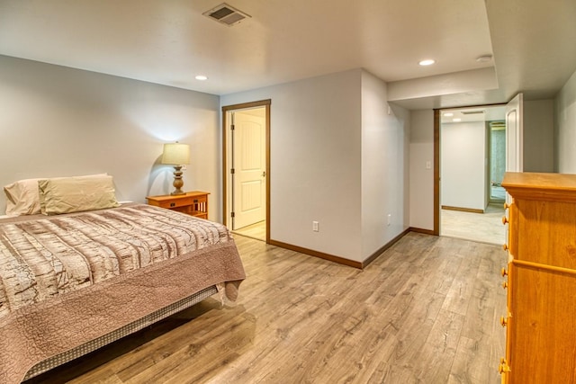 1030 S Sunset Bench Rd, Stevensville, MT 59870 - bedroom with light wood finished floors, baseboards, and recessed lighting