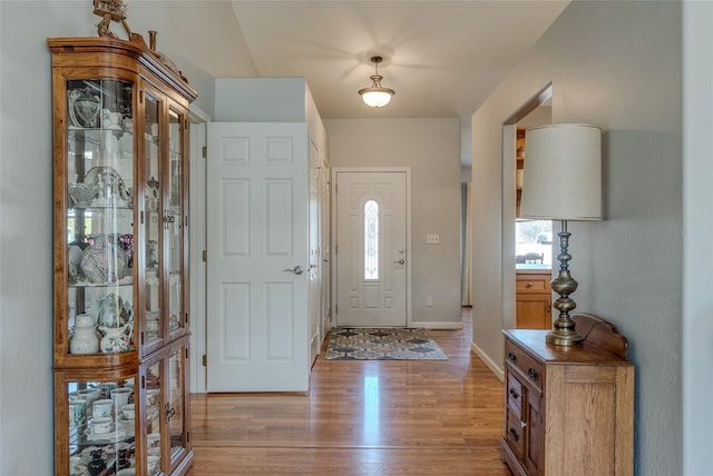 675 Pebble Dr, Kalispell, MT 59901 - foyer with light wood-type flooring and baseboards
