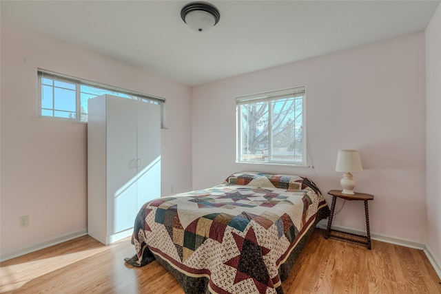 675 Pebble Dr, Kalispell, MT 59901 - bedroom featuring light wood-style floors and baseboards