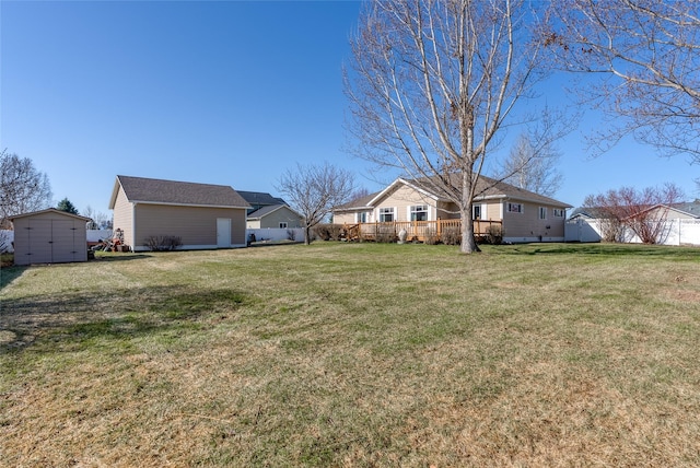 675 Pebble Dr, Kalispell, MT 59901 - view of yard featuring a storage unit