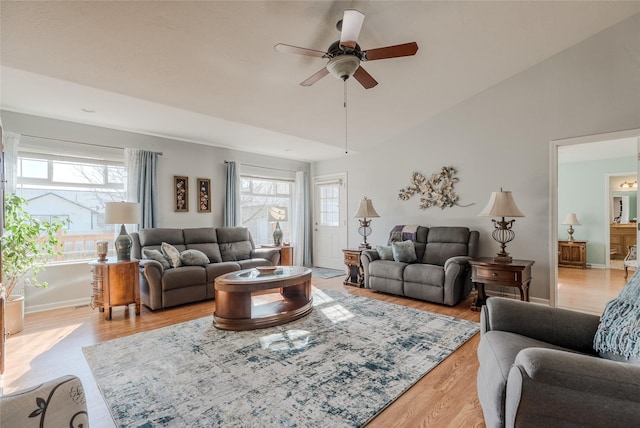 675 Pebble Dr, Kalispell, MT 59901 - living room featuring plenty of natural light, a ceiling fan, and light wood finished floors