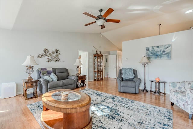 675 Pebble Dr, Kalispell, MT 59901 - living area featuring lofted ceiling, ceiling fan, and light wood-style flooring