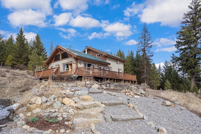 4695 Star Meadow Rd, Whitefish, MT 59937 - rear view of property with a deck