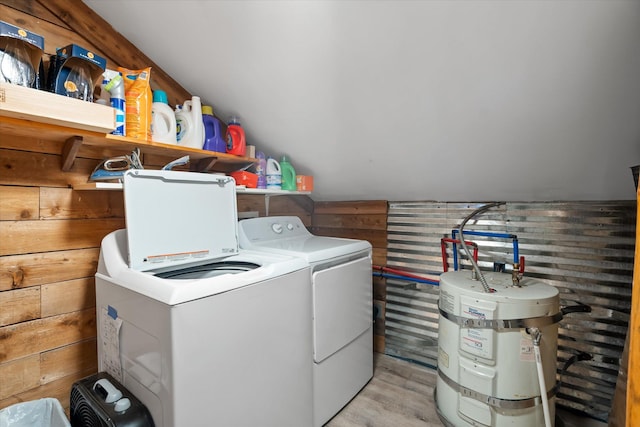 4695 Star Meadow Rd, Whitefish, MT 59937 - laundry area featuring independent washer and dryer, secured water heater, and wood walls