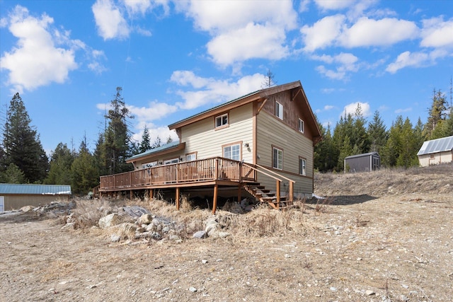 4695 Star Meadow Rd, Whitefish, MT 59937 - back of property with a wooden deck