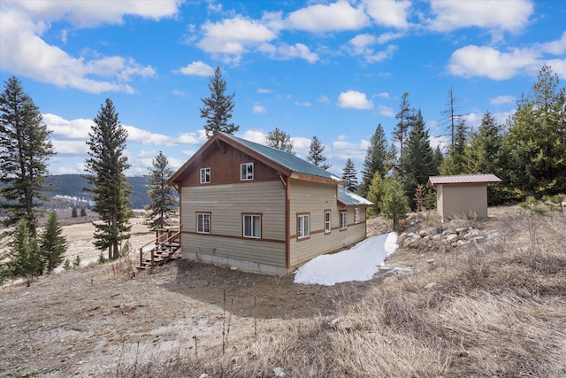 4695 Star Meadow Rd, Whitefish, MT 59937 - view of home's exterior featuring a metal roof