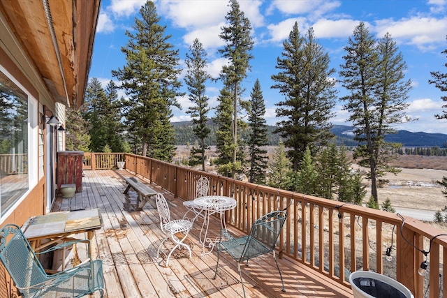 4695 Star Meadow Rd, Whitefish, MT 59937 - wooden deck featuring a mountain view